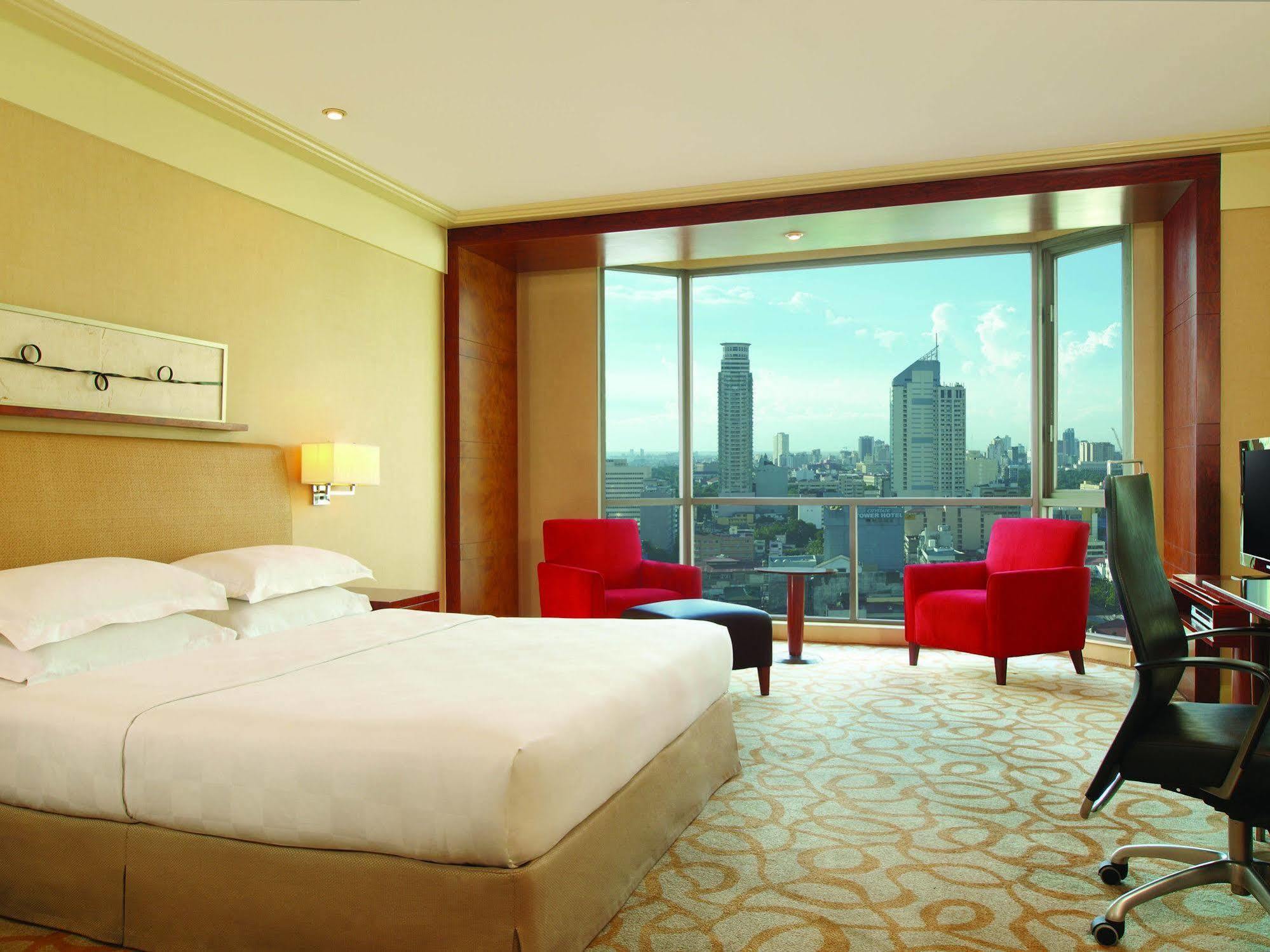 New Coast Hotel Манила Экстерьер фото A room at the hotel
